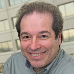 This is the headshot of Peter Vinella, white male.